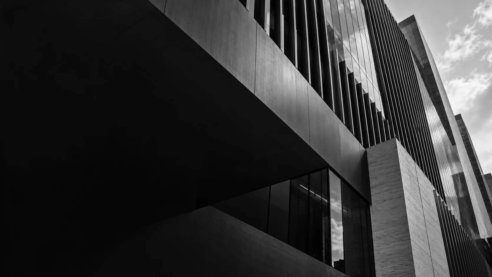 Conceptual facade with deep architectural shadows